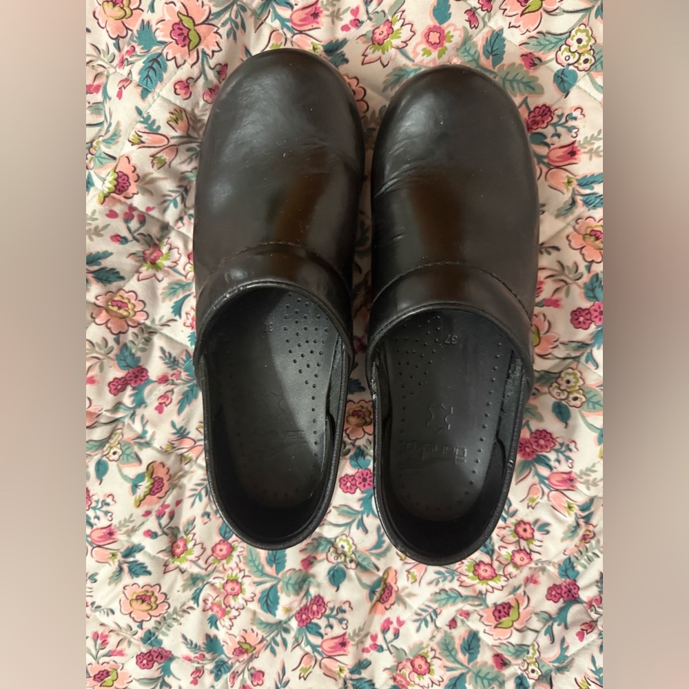 Women’s Dansko Slip-On Black Leather Clogs